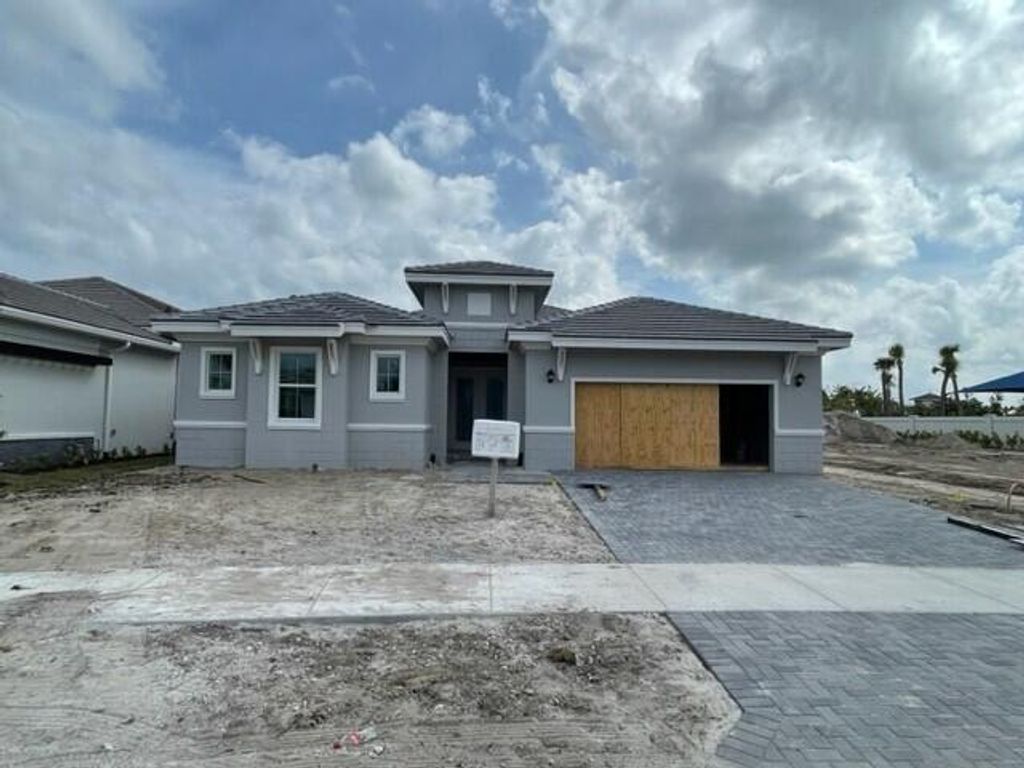 Photo of 9949 Seagrass Way, Palm Beach Gardens, FL 33412 (MLS # R10857216)