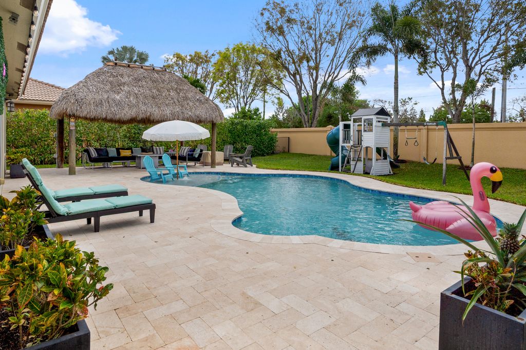 Photo of 144 Bella Vista Way, Royal Palm Beach, FL 33411 (MLS # B26011141)
