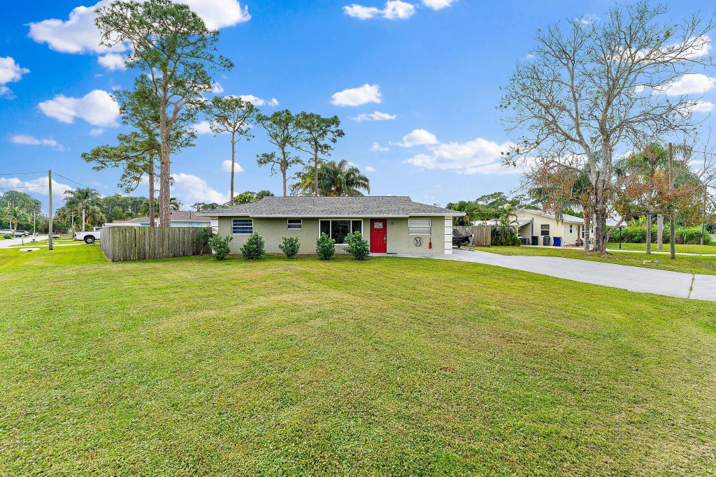 Photo of 5854 SE Orange Blossom Trail, Hobe Sound, FL 33455 (MLS # R11075687)