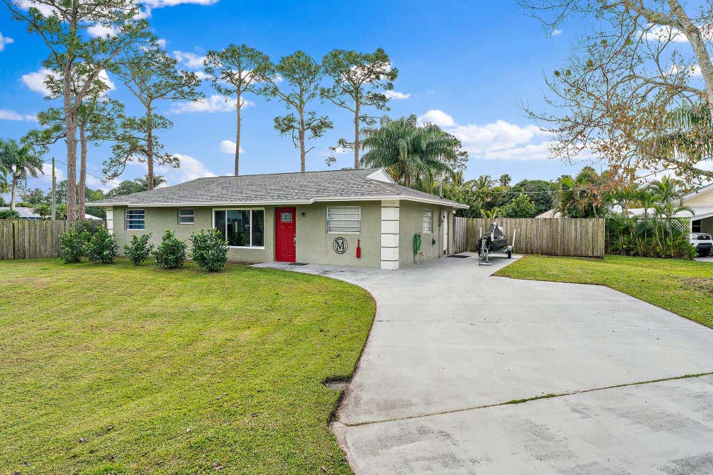 Photo of 5854 SE Orange Blossom Trail, Hobe Sound, FL 33455 (MLS # R11075687)