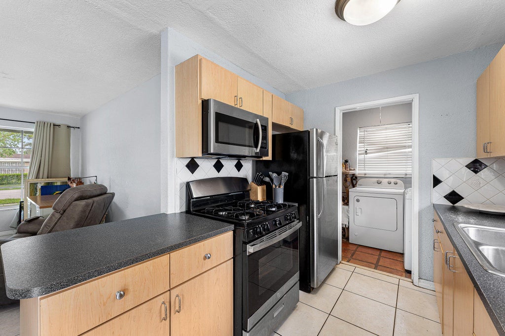 Photo of 5543 SW 7th Street, Margate, FL 33068 (MLS # B26047142)