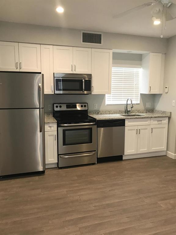 A unique opportunity to live in a newly renovated apartment steps from Antique Row in West Palm Beach. This unit has 1 bedroom and 1 bath. The Kitchen and living area boast an open floor plan, hardwood cabinets, granite countertops, stainless steel appliance, and GE washer and dryer. Conveniently located off Dixie Hwy and Southern Blvd giving you access to downtown WPB, Palm Beach Island, PBI, PBA and more. Tenant to pay $75.00 monthly water fee.