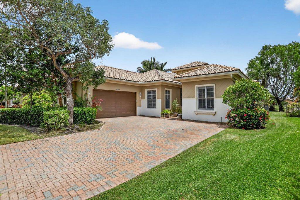Photo of 12157 NW 76th Place, Parkland, FL 33076 (MLS # F10507279)