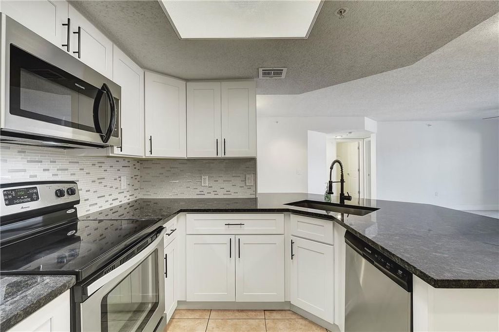 Photo of 5025 Wiles Road #207, Coconut Creek, FL 33073 (MLS # F10421370)