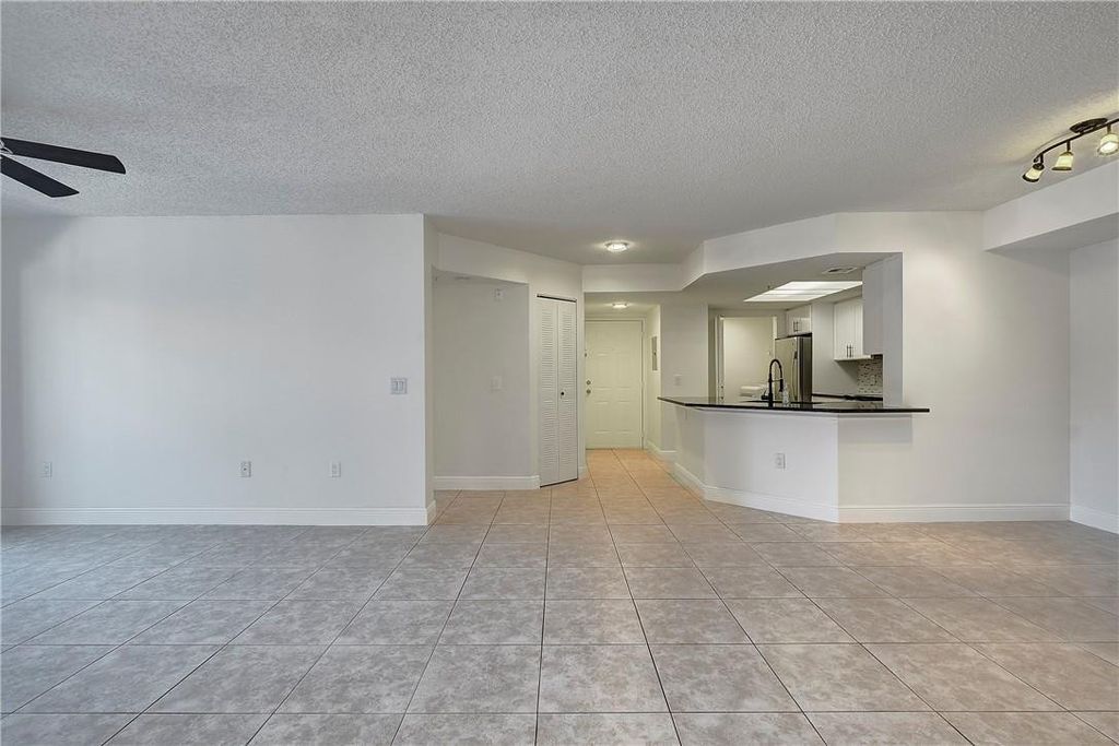 Photo of 5025 Wiles Road #207, Coconut Creek, FL 33073 (MLS # F10421370)