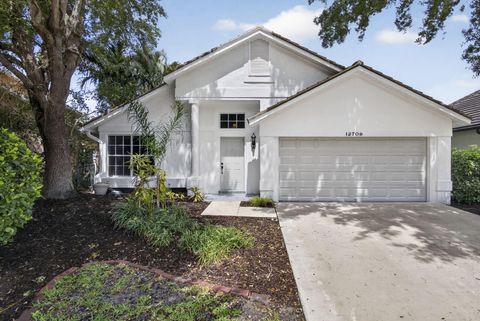 Photo of 12709 White Coral Drive, Wellington, FL 33414 (MLS # B26013395)