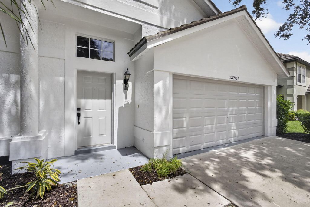 Photo of 12709 White Coral Drive, Wellington, FL 33414 (MLS # B26013395)