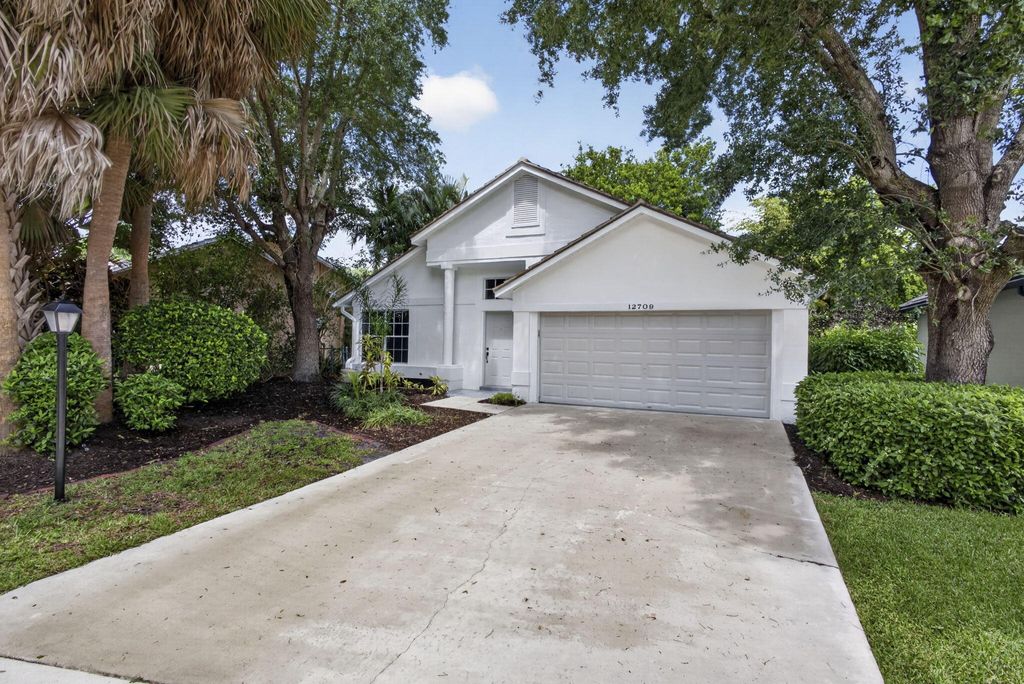 Photo of 12709 White Coral Drive, Wellington, FL 33414 (MLS # B26013395)