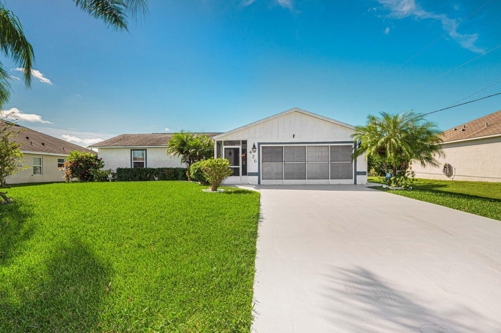 Photo of 426 SW Exmore Avenue, Port Saint Lucie, FL 34983 (MLS # R11030131)