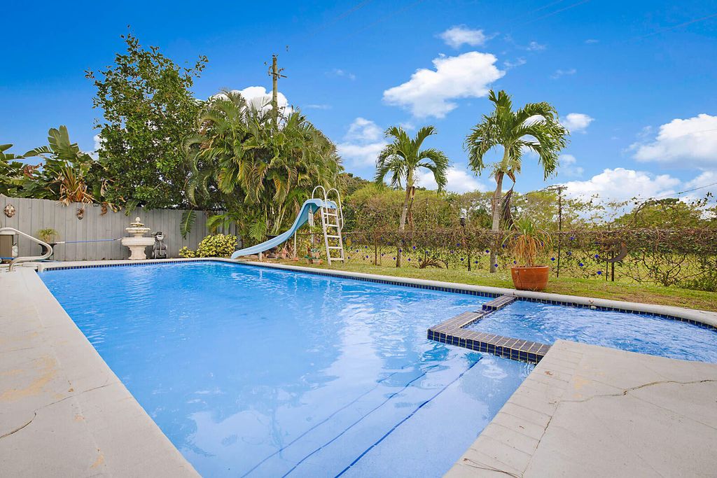 Photo of 4422 Brandywine Drive, Boca Raton, FL 33487 (MLS # B26022855)