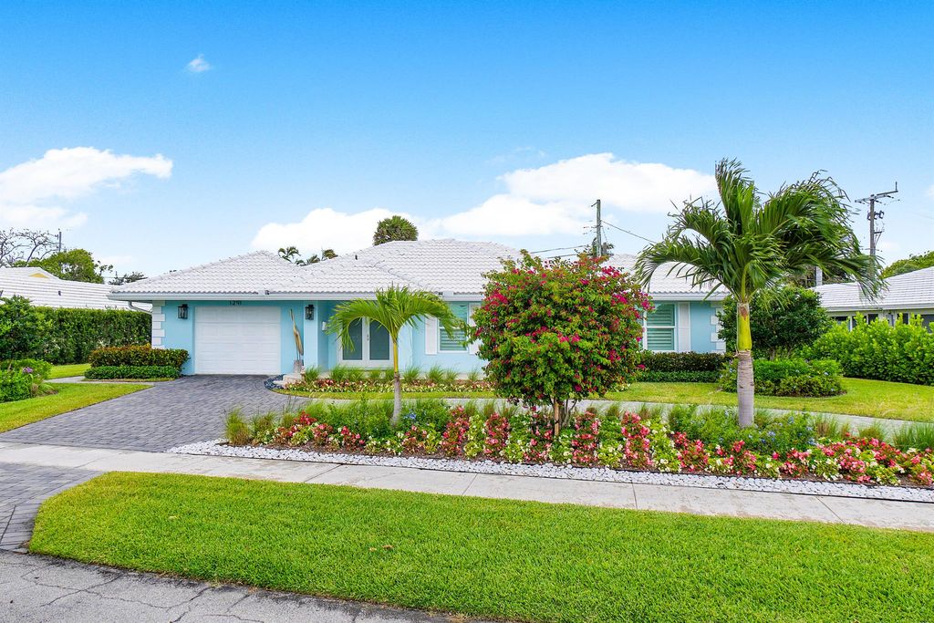 Photo of 1291 SW Sugar Plum Drive, Boca Raton, FL 33486 (MLS # R10988678)