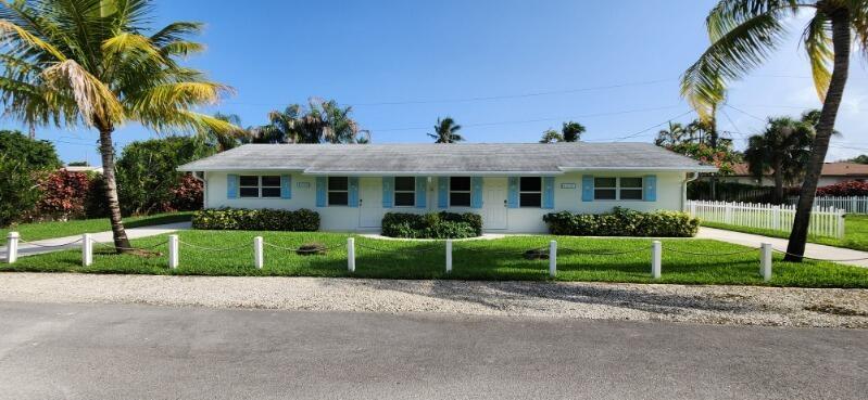 Hurry and take a look at this half duplex, 2 bedroom 1 bath, located in the sought after town of North Palm Beach!!! Competitively priced, it won't last long! Great Schools! Beach, shopping, restaurants, all right around the corner! The property is vacant and ready for you to move into IMMEDIATELY!