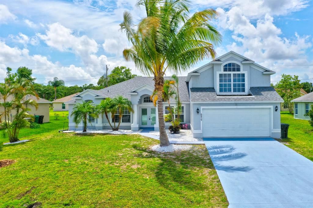 Photo of 6859 NW Dragon Street, Port St Lucie, FL 34983 (MLS # R10889541)