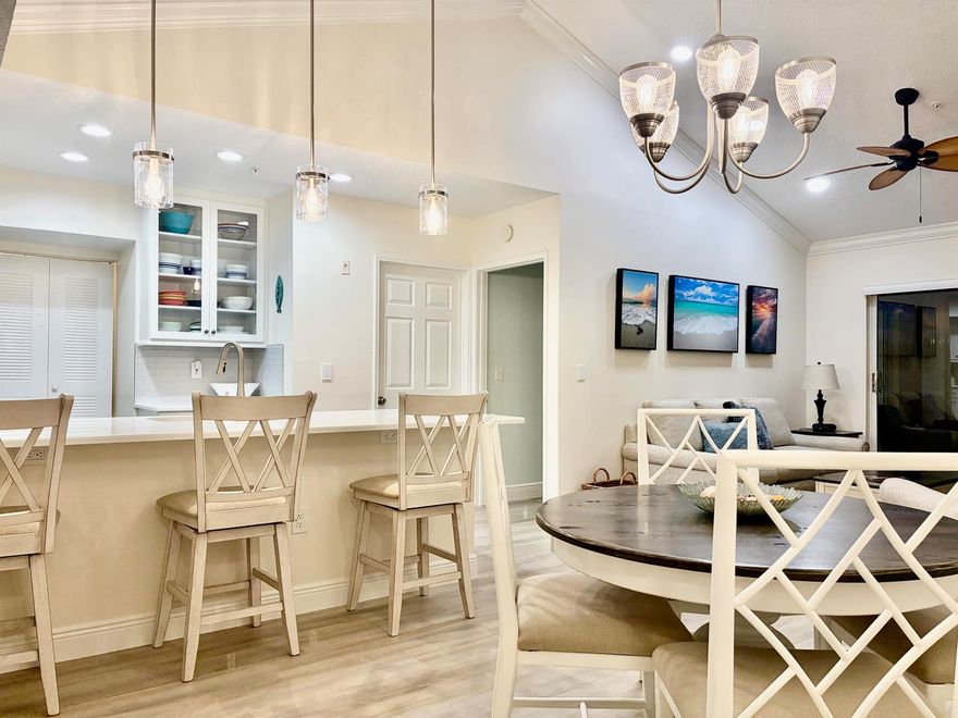 Jupiter/Tequesta Florida Seasonal Rental. Escape the cold and enjoy the Florida sunshine in this beautifully remodeled 2-bedroom, 2 bath condo in the desirable Lighthouse Cove at Tequesta community. Located on the top 3rd floor, this bright and spaciouos condo features vaulted ceilings, luxury flooring and a sophisticated designer kitchen with quartz countertops, elegant backsplash, and stainless steel appliances. The open layout leads to a screened lani overlooking the lush, park-like grounds & resort style pool, perfect for relaxing mornings or evening sunsets.Additional features include laundry in unit, 2 assigned parking spaces, beautifully furnished, turnkey ready, 90 day min. Amenities also include tennis court, fitness room, business center, billiards, racquetball court.