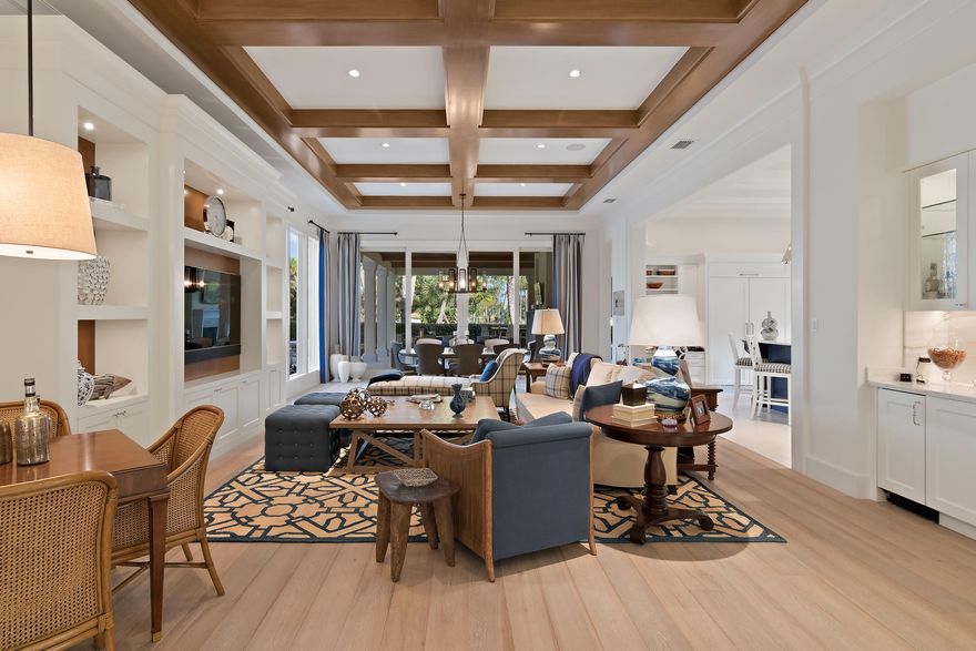 This stunning, rare to the market Bentley model built by renown builder Paul Courchene is one of a kind. Located on the 17th hole with a wide open common space on one side of the home that will never be built on. Beautifully appointed and professionally decorated. Gourmet kitchen is a chefs dream with Irpinia Cabinets and SS Thermador appliances, natural gas 6 burner cooktop w/ grill, double ovens, His and Her master baths. Cabana bath, 2 natural gas fireplaces and home generator. Old Palm Golf Club is one of the finest clubs in the country offering limited membership, privacy, luxury and superior services. The 18 hole golf course designed by Raymond Floyd w/a 19th ''bye'' hole and private golf studio offering 3 practice holes, hitting bay w/ V-1 swing analysis, dual ended driving range.