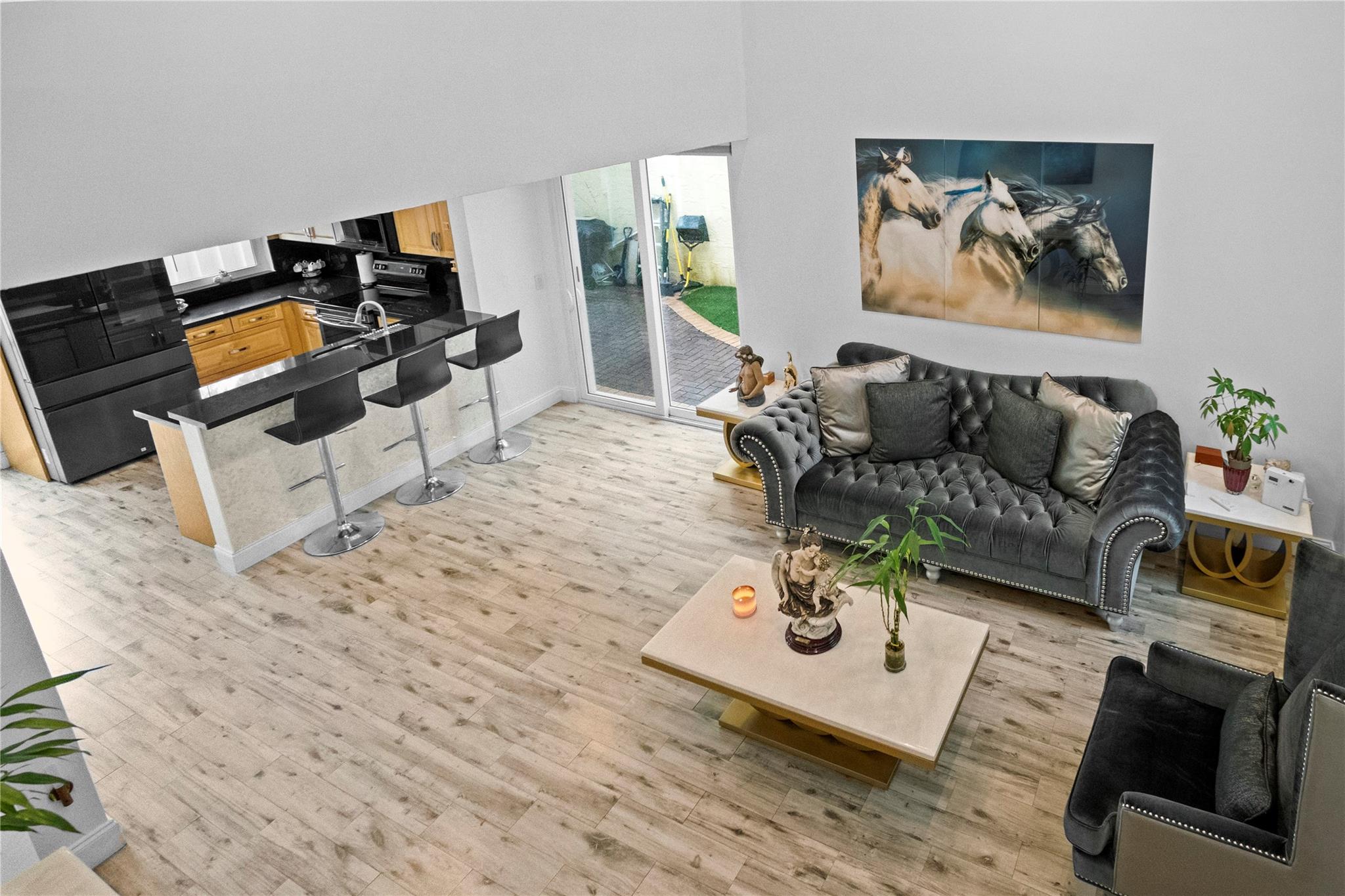 This stunning Plantation home offers modern comfort and style, featuring a newer roof, impact windows, and brand-new appliances, including a smart refrigerator. A comprehensive security system and spacious fenced patio provide peace of mind and outdoor living space. With new AC, washer, and dryer, this move-in-ready home is perfectly situated near major highways, Sawgrass Mills, and upscale restaurants. The motivated seller is ready to make a deal – bring your best offer!