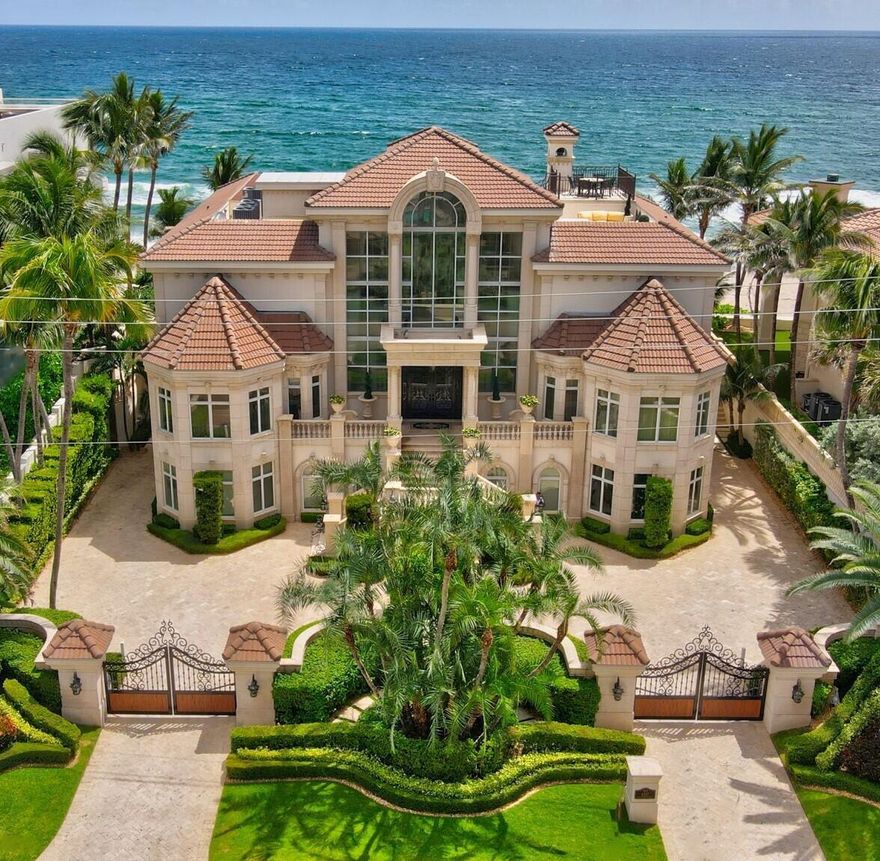 Located in the small idealistic Palm Beach, FL coastal Town of Highland Beach.Walk just 15 feet out your back door to your own 11,000 square foot private beach and gorgeous red reef at this breathtaking Estate that boasts 6 bedrooms, 6 full bathrooms, 2 half baths, elevator, 3 kitchens (gourmet, second, and summer) for fabulous entertaining, a world class gym area, a 12- car drive through air-conditioned garage and car showroom, 2 separate ground floor suites with exterior ingress and egress, oceanside saltwater pool and spa with a swim up bar, cabana room with private outside saltwater spa, large poolside covered loggia, roof top terraces for private sunbathing, alfresco dining and unobstructed views of sunrises and sunsets,