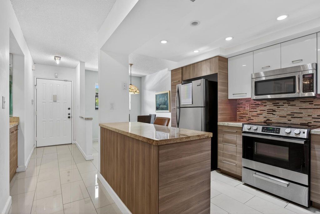 Photo of 7547 NW 79th Avenue #212, Tamarac, FL 33321 (MLS # R11150972)