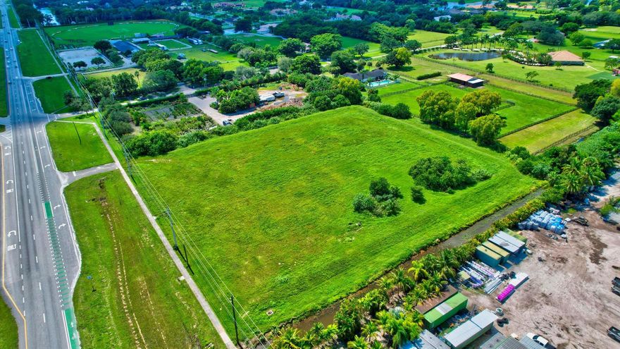 3.63 acres of prime commercial land available for sale, located in what is undoubtedly one of the best locations in Delray Beach, right on 441. The property's strategic positioning offers a unique blend of tranquility and accessibility, making it an ideal choice for a range of potential uses.  The evolving landscape of Delray Beach and the surrounding area makes this parcel an attractive investment opportunity for those looking to capitalize on the increasing demand for commercial space. Can be purchased together with the adjacent lot of 2.7 acres