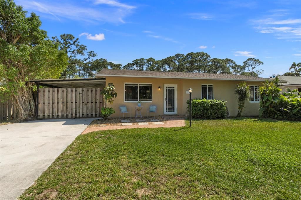 Photo of 6144 SE Orange Blossom Trail, Hobe Sound, FL 33455 (MLS # R10877303)