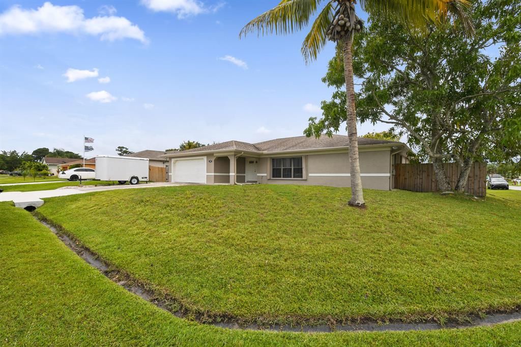 Photo of 1602 SE Ocean Lane, Port Saint Lucie, FL 34983 (MLS # R10722386)