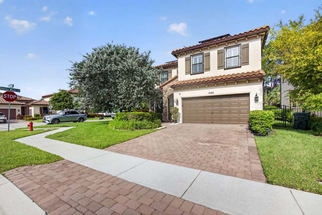Photo of 6026 Night Heron Court, Greenacres, FL 33415 (MLS # B26060145)