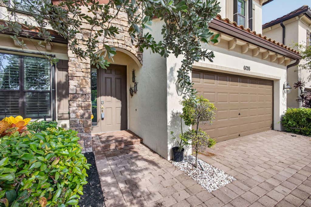 Photo of 6026 Night Heron Court, Greenacres, FL 33415 (MLS # B26060145)