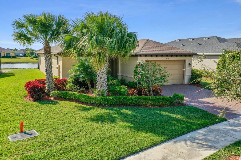 Photo of 11302 SW Lake Park Drive, Port Saint Lucie, FL 34987 (MLS # R10965944)