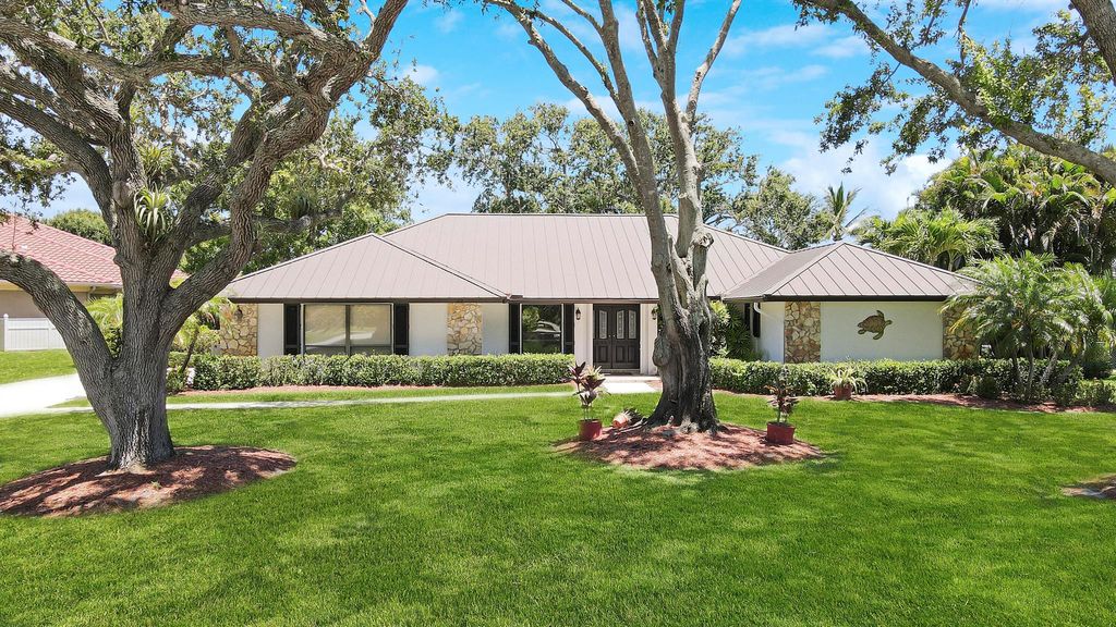 Photo of 59 SE Turtle Creek Drive, Tequesta, FL 33469 (MLS # R10958856)