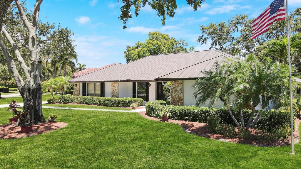Photo of 59 SE Turtle Creek Drive, Tequesta, FL 33469 (MLS # R10958856)
