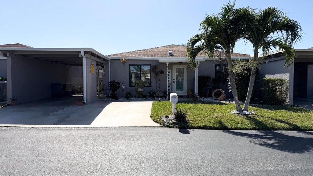 Photo of 14846 Wildflower Lane, Delray Beach, FL 33446 (MLS # R11158709)