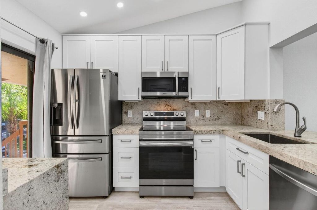 Photo of 3939 NE 5th Avenue #F201, Boca Raton, FL 33431 (MLS # R11139232)