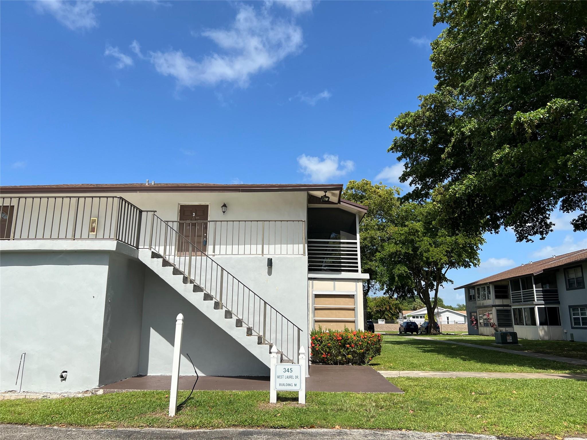 Laurels of Margate condo east of 441. This 2nd floor, 1 bedroom 1.5 bath condo has large, eat-in kitchen, screened balcony and has been thoroughly cleaned and ready for a new owner! RHEEM A/C 2023. This bldg. is just steps to clubhouse and pool, and tennis and basket ball is nearby. . No renting for 3 years. TWO pets ok max 30#.
