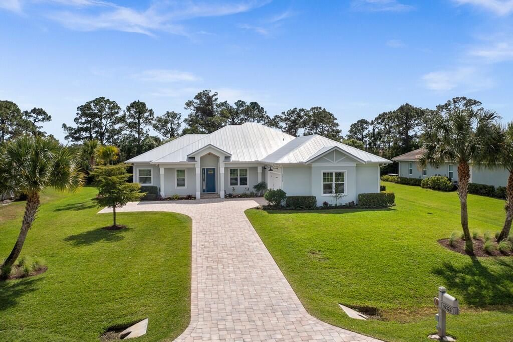 Photo of 10328 SW Fiddlers Way, Palm City, FL 34990 (MLS # R10779539)