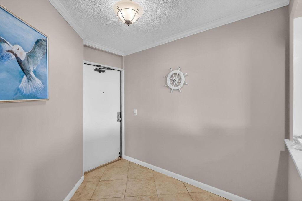 Photo of 9650 S Ocean Drive #210, Jensen Beach, FL 34957 (MLS # B26028122)
