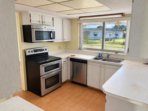 Tiny photo for 411 SE SUNNYDALE Lane, Port Saint Lucie, FL 34983 (MLS # B26090074)