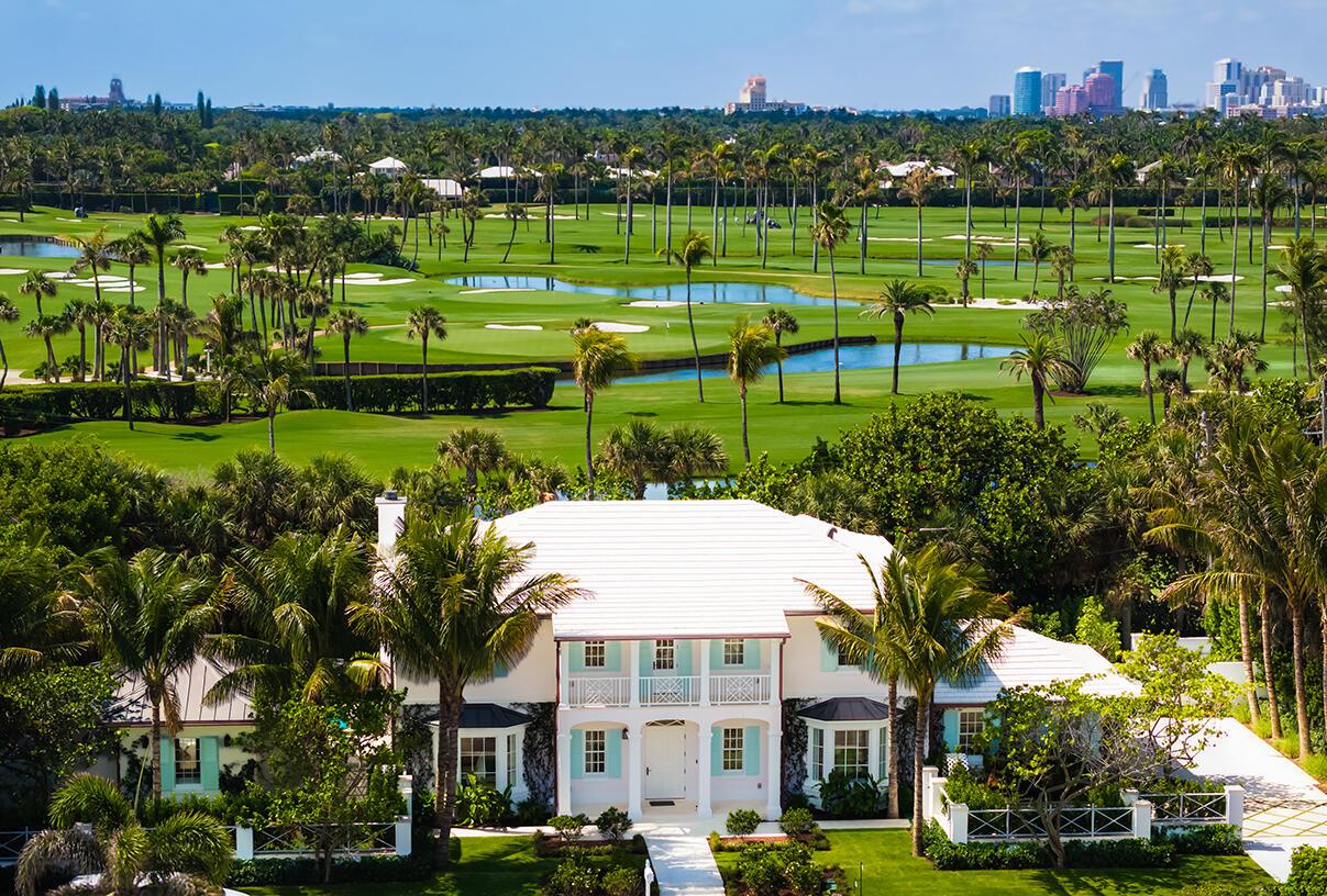 A ''PALM BEACH'' architectural gem has just been completed and is move-in ready. This exquisite home is south facing and includes a wonderful separate guest house overlooking the swimming pool. With over 5,700 sq. ft., there's a total of 4 bedrooms and 6 and 1/2 baths, all with WaterWorks fixtures. Stunning details include vaulted and trayed ceilings, white oak floors and beautiful millwork creating a luxury experience. This light filled home includes a separate library, dining room, eat in kitchen and outdoor covered loggia all of which are ideal for entertaining. The master bedroom has separate his/her closets and bathrooms with an oversized private terrace. Additional features include an elevator, an oversized 2 car garage and a full house generator. Landscape was designed SEE MORE: