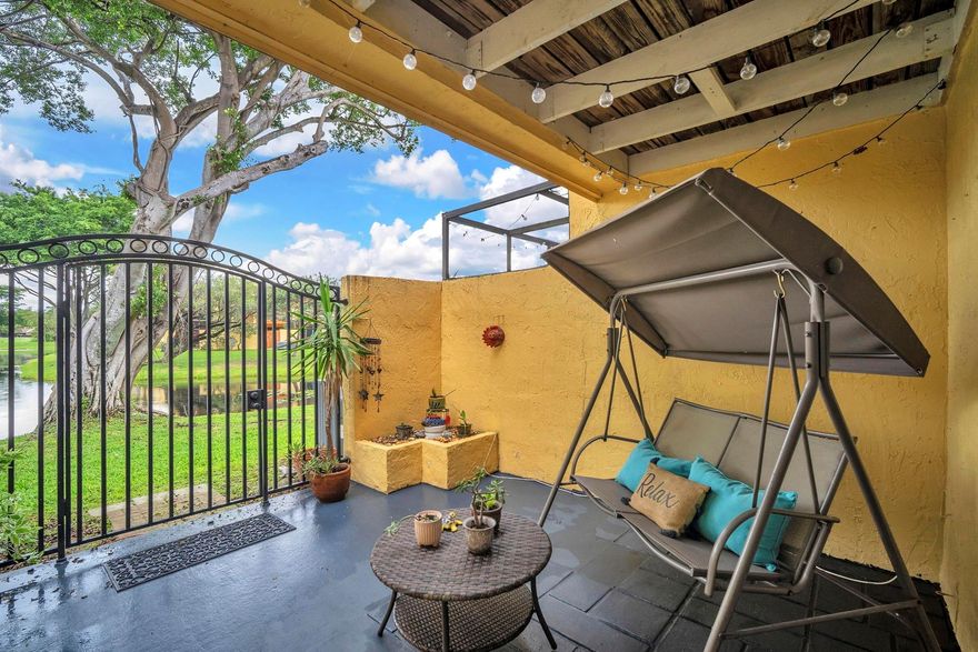 Welcome to your lakeside retreat in Pembroke Pines! This spacious 4 bed, 3 bath two-story condo features peaceful lake views, a private fenced patio, and two balconies—perfect for morning coffee or evening sunsets. The bright layout offers stainless steel appliances, barn doors in the laundry area, and stylish finishes. On the first floor, a bedroom functions as a cozy TV room with its own full bathroom access. The second floor offers large bedrooms with abundant closet space. Community amenities include a pool, gym, clubhouse, billiard room, and tennis courts. Two assigned parking spots, fresh sealcoating and striping, painting coming soon, and no association approval required. Enjoy worry-free living with major updates: Brand New Washer/Dryer, Roof & Electric Panel (2024), AC (2020).