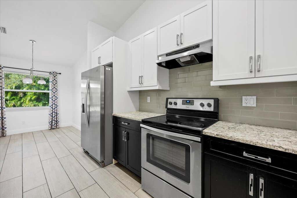 Photo of 3610 SW Savona Boulevard, Port Saint Lucie, FL 34953 (MLS # R11045805)