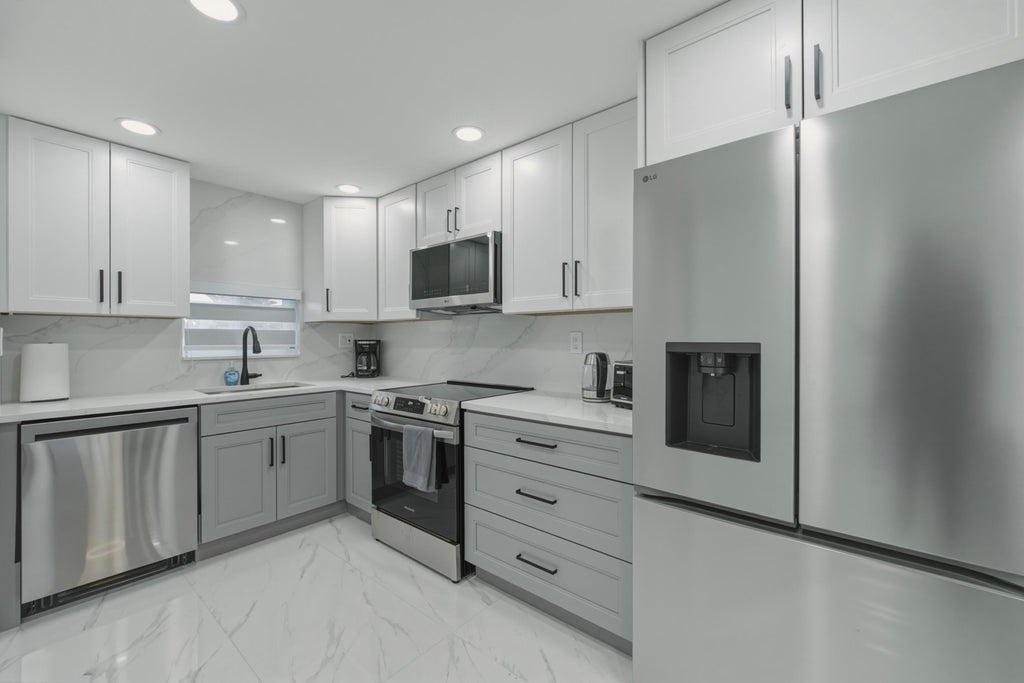 Photo of 9523 S HOLLYBROOK LAKE Drive #107, Pembroke Pines, FL 33025 (MLS # B26093371)