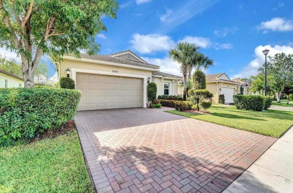 Photo of 2818 Bellarosa Circle, Royal Palm Beach, FL 33411 (MLS # R11141649)