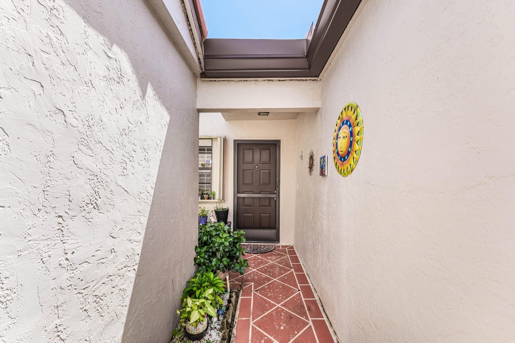Photo of 6375 KINGS GATE Circle, Delray Beach, FL 33484 (MLS # B26077343)