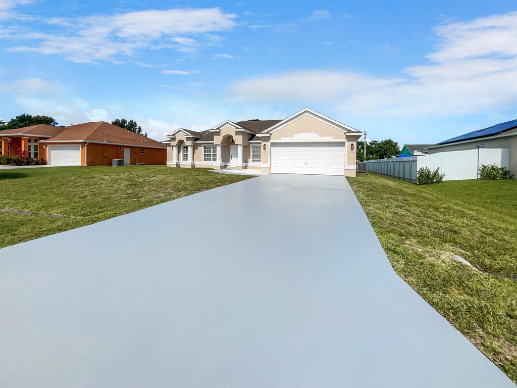Photo of 2156 SE Stargrass Street, Port St Lucie, FL 34984 (MLS # R10894884)