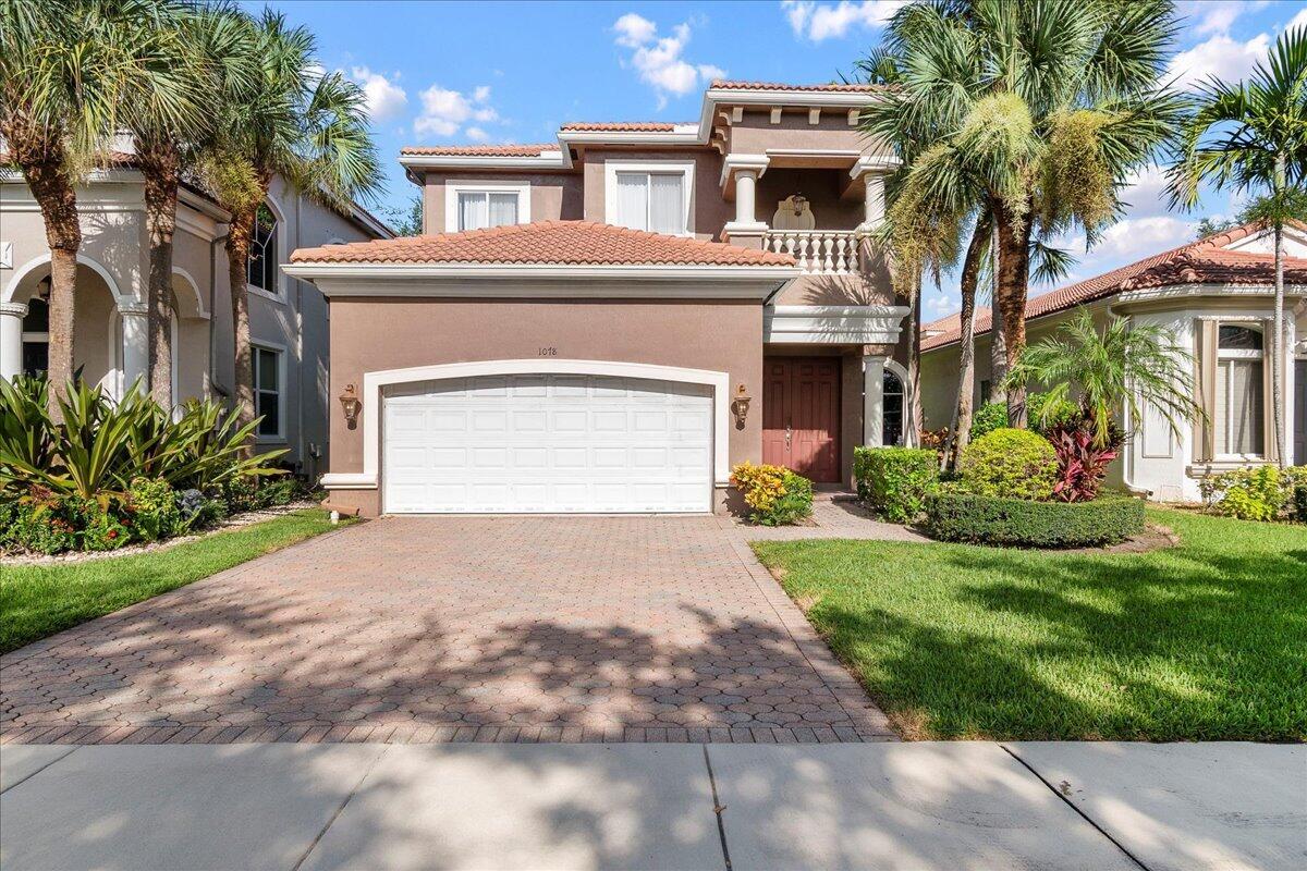 Located in gated Palmyra Estates, this spacious 4-bed, 2.5-bath home offers tranquil lake views and a well-designed layout. The kitchen features abundant cabinetry, granite counters, whirlpool appliances, recessed lighting, pull-out drawers, and a charming bay window with seating and lake views. Enjoy a large family room with privacy-tint sliders, recessed lighting, and plenty of natural light. Upstairs, the primary suite offers double doors, Roman tub, separate shower, split dual vanities, and double closets. Second bedroom also overlooks the lake. 2019 AC, 2006 roof. Community offers pool, playgrounds, BBQ area, and walking paths.