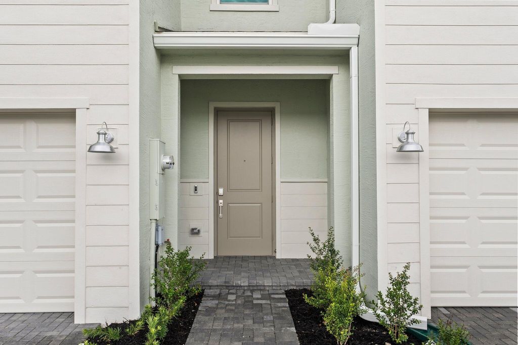 Photo of 219 SE Woodbark Street, Port Saint Lucie, FL 34984 (MLS # R11060188)