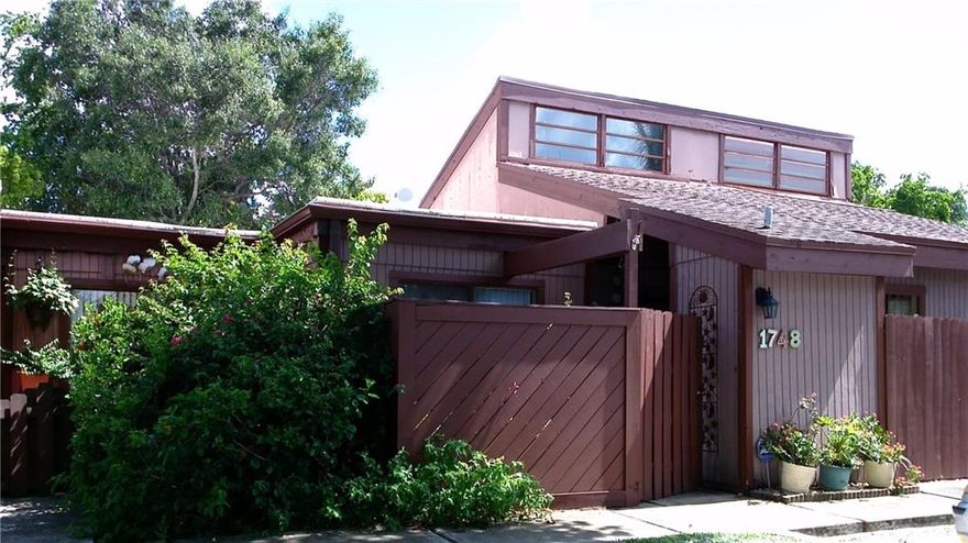 2/2 villa with washer and dry in shed in front fenced potion. Screened porch looking into rear patio, can grill outside. 1076 sq Ft with cathedral ceilings. Can rent immediately, one time a year. Lots of closet space.
