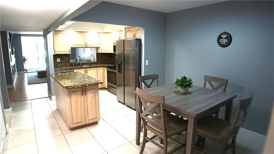 Lovely updated two bedroom two bathroom, first floor CORNER condo with parking directly out front and DOCKAGE directly out back. Features include remodeled kitchen with granite counter tops, 2 remodeled bathrooms with a window in each, tiled dining room and kitchen, laminate floor in Living Room and both bedrooms, enclosed patio for additional square footage, hurricane shutters, WASHER/DRYER IN UNIT, and best of all dockage for up to a 27' boat. Amenities include 24 hour manned security, function hall, exercise room, billiard room, putting green, heated pool, sauna, hot tub, etc. Community is close to beaches, shopping, dining, Greg Norman designed golf course, and newly redeveloped Pompano Beach Pier.