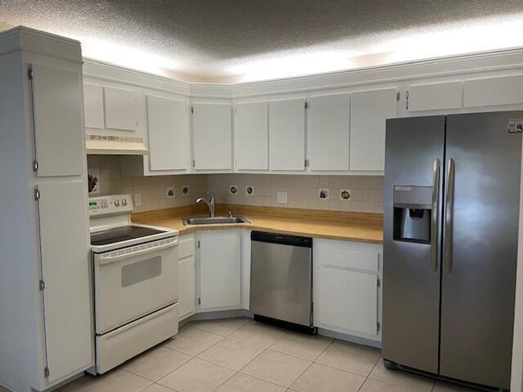 Photo of 204 Foxtail Drive #F2, Greenacres, FL 33415 (MLS # R11095562)