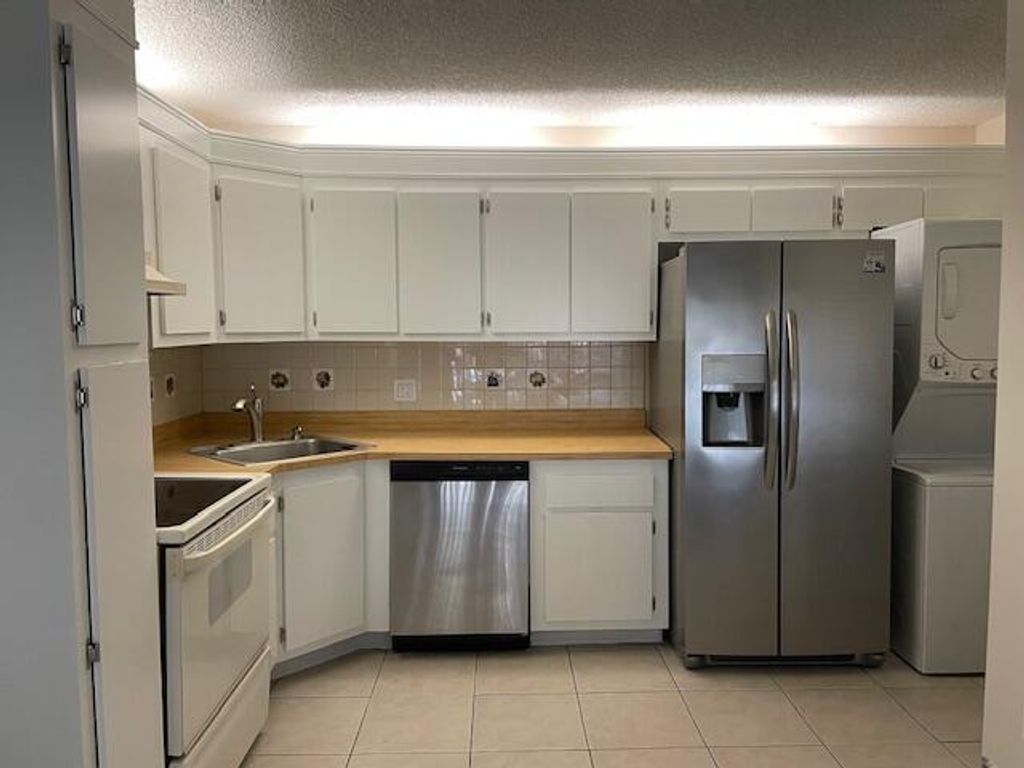 Photo of 204 Foxtail Drive #F2, Greenacres, FL 33415 (MLS # R11095562)