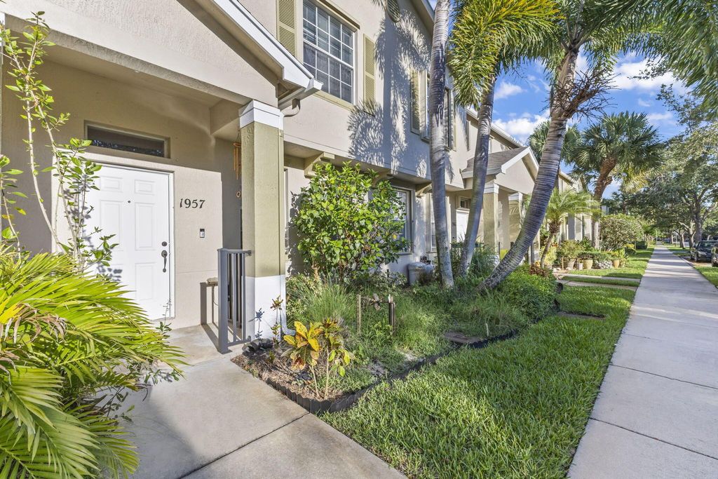 Photo of 1957 SE Avon Park Drive, Port Saint Lucie, FL 34952 (MLS # R11092754)